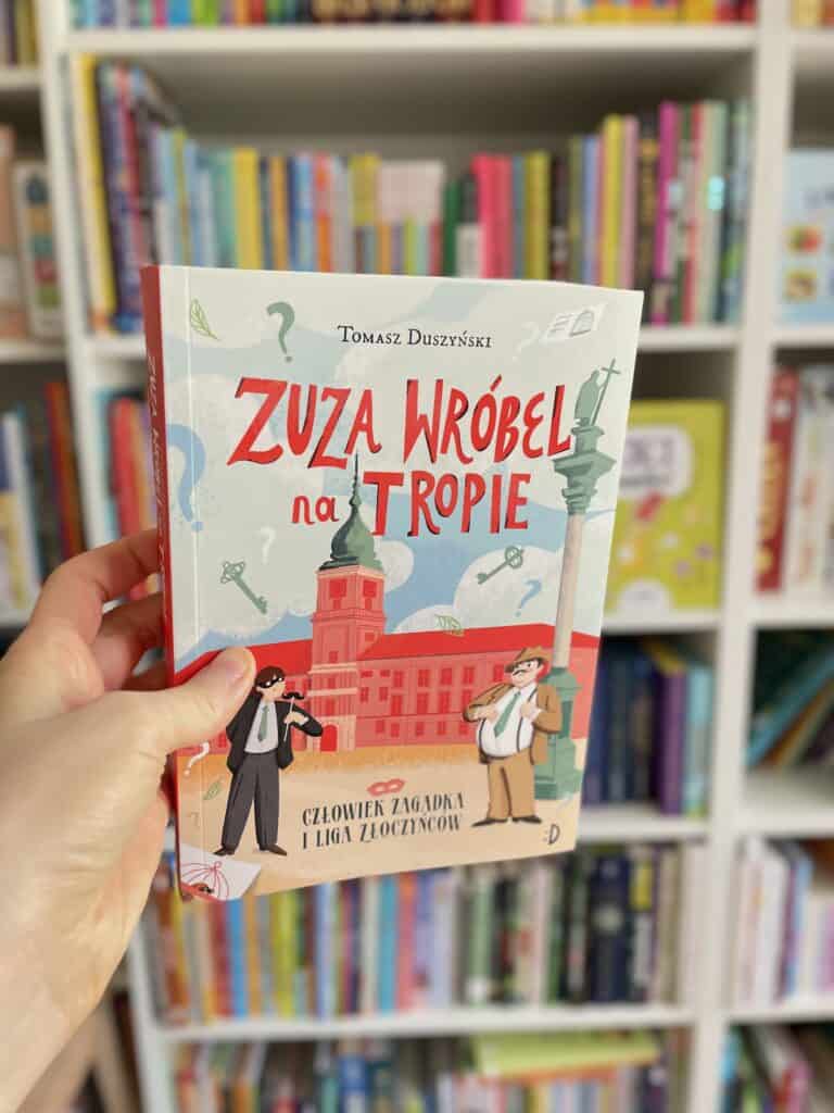 czlowiek-zagadka-i-liga-zloczyncow-zuza-wrobel-na-tropie-wydawnictwo-dwukropek-tom-3-recenzja-ksiazki-dla-dzieci aktywne czytanie